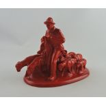 A continental flambe glazed figure group, shepherd with his flock, W. 18cm.