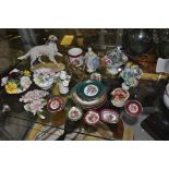 A quantity of decorative ceramics including Limoges cabinet dishes, porcelain floral sprays,