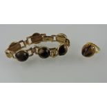 A tiger's eye bracelet, set in yellow metal stamped 375, together with a ring, 34.3g.