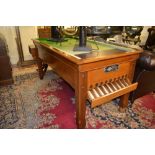 An early 20th century mahogany bar billiards table.