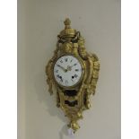 A Louis XV design ormolu cartel clock,