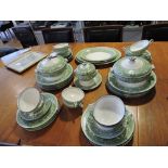 A Wedgwood 'Florentine' part dinner and tea service, with a green band,