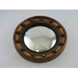 A small convex wall mirror in the early 19th century style, D.