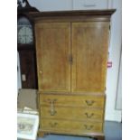 An American Henredon furniture crossbanded walnut media cabinet modelled as a George II linen press,