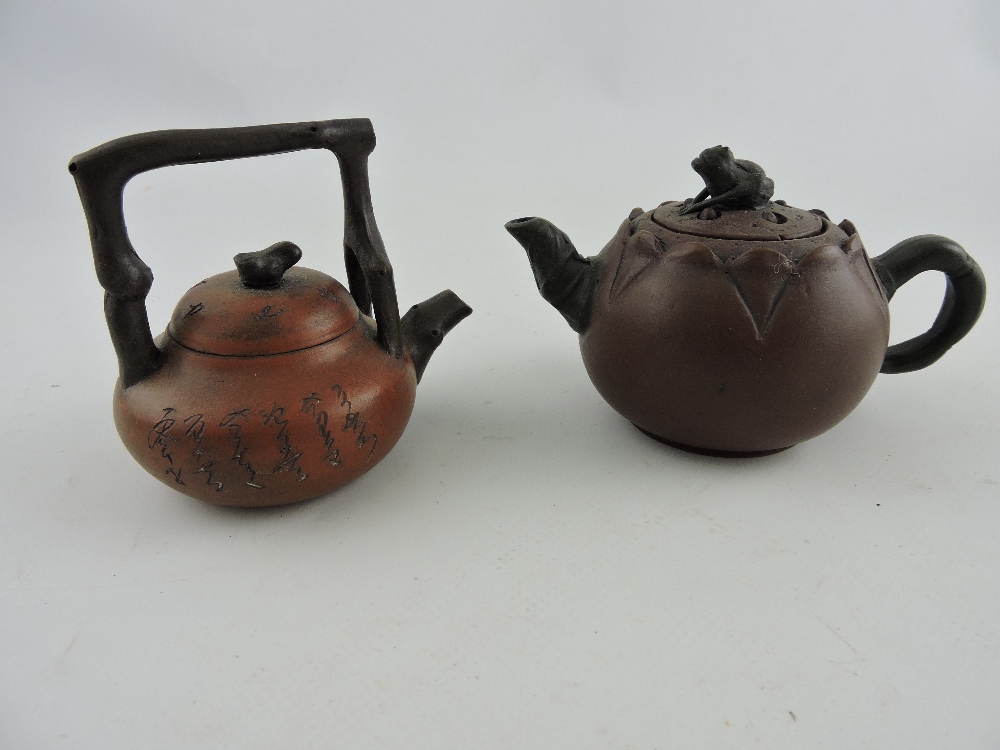 A Yixin teapot, modelled in the form of a lily flower, the knop as a frog, H.