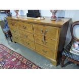 An American Henredon furniture crossband walnut chest,