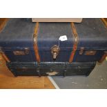 Two early 20th Century wood bound canvas covered steamer trunks