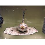 A 20th Century Iranian white and floral enamelled tray decorated with a view of Tehran,
