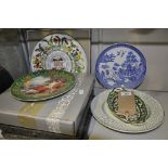 Six assorted pottery and porcelain plates and dishes to include two boxed Wedgwood examples