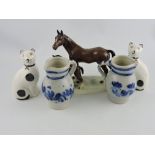 A pair of Rhineland blue and white salt-glazed jugs, H.