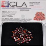 A cluster of unmounted garnets of faceted pear shape, approx 21ct total weight.