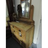 A late Victorian light oak three drawer dressing chest,