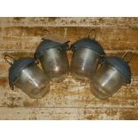 Four Russian industrial ceiling lights.