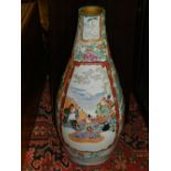 A large late 19th / early 20th century Japanese vase, decorated with vignettes of warriors amongst