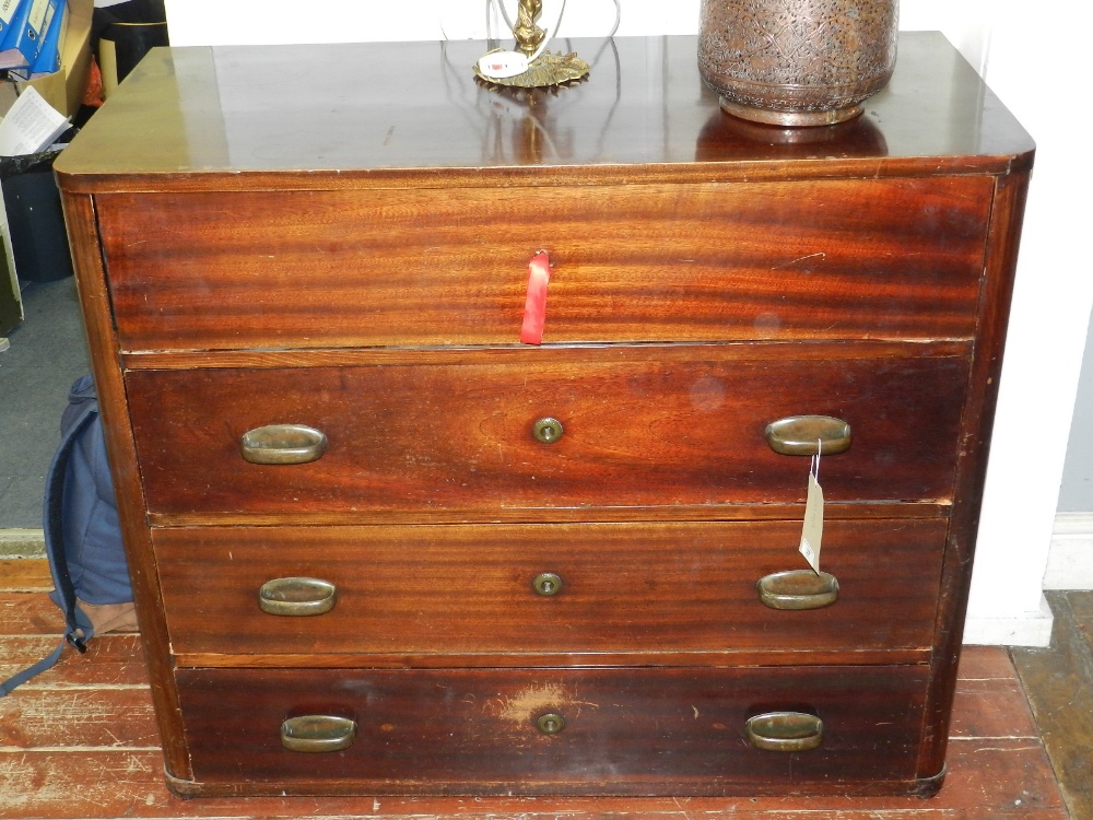 A 20th century mahogany chest of four long drawers. H.96cm W.113cm D.