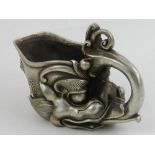 A Chinese white metal libation cup, in the form of a dragon. L.