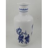 A late 19th / early 20th century blue and white porcelain baluster vase, decorated with warriors,