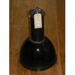 A black industrial hanging lamp. H.52cm