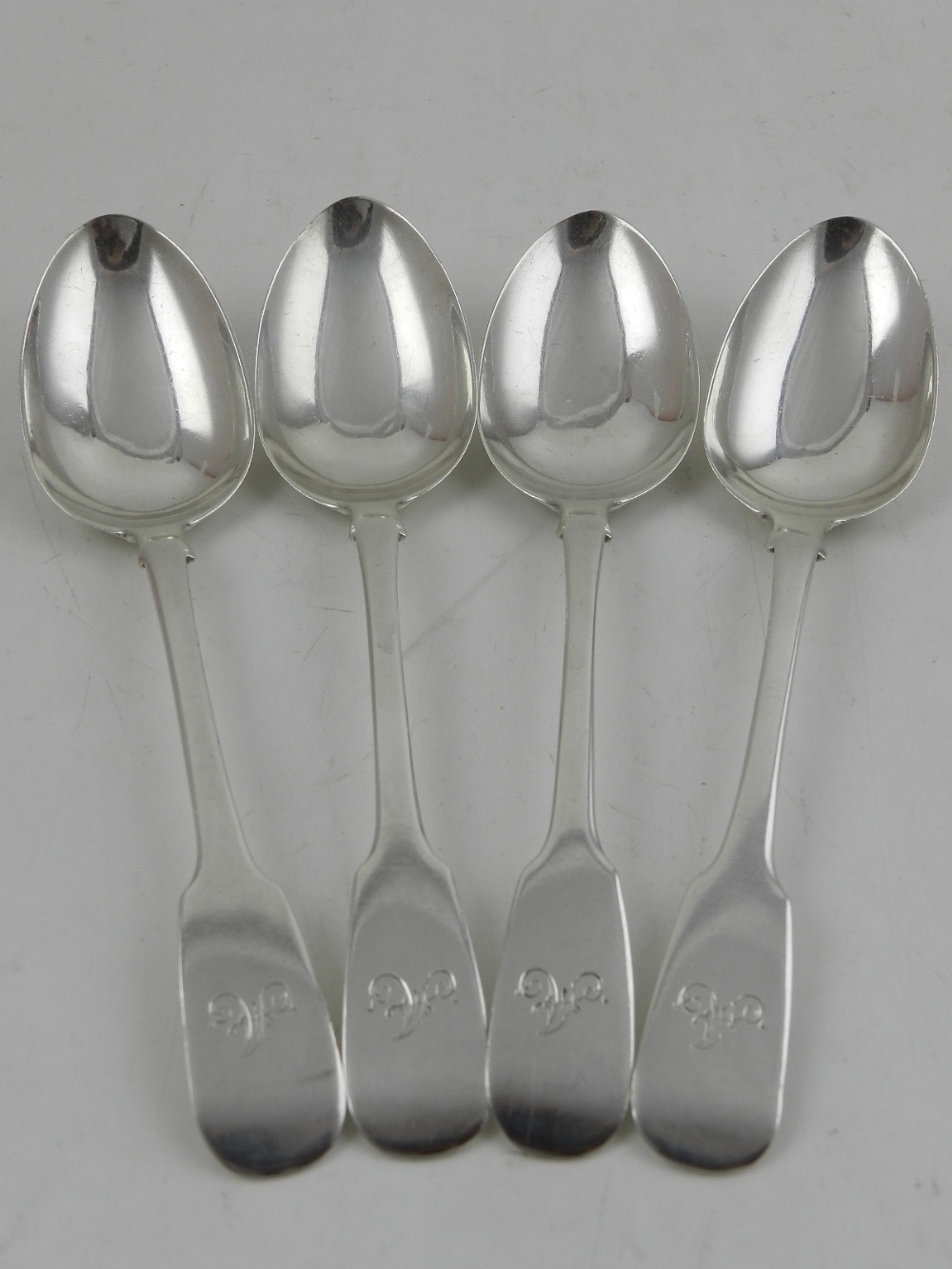 Four Scottish silver dessert spoons, hallmarked Edinburgh 1837, maker Andrew Davidson, Arbroath..