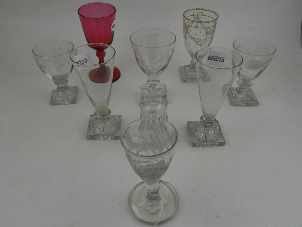 A collection of 18th century and late cut glass drinking glasses,