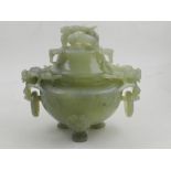 A Chinese carved and pierced celadon jadeite koro and cover,