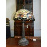 A 20th century stained glass table lamp, in the Tiffany style.