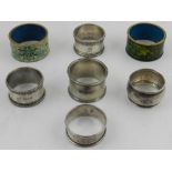 Five silver napkin rings, various hallmarks, together with two cloisonne napkin rings.