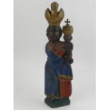 An unusual Russian orthodox (?) carved wooden figure holding a baby. H.