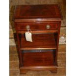 A 20th century mahogany cabinet, having one single drawer below two shelves. H.