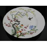 A late 19th / early 20th century famille rose porcelain charger, painted with blossoms,