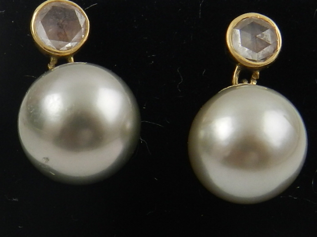 A pair of 18 carat yellow gold, diamond, and South Sea pearl drop earrings, the grey pearls each