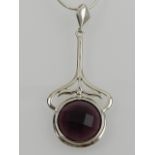 A silver and faceted amethyst set pendant on a silver chain.