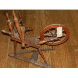 An early 20th century spinning wheel.