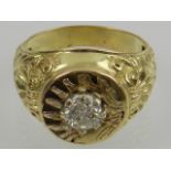 A yellow gold and solitaire diamond set gents ring, the stone of approx. 0.9 carats.