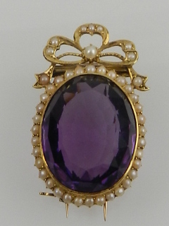 A yellow gold, split seed pearl, and amethyst brooch, in the 19th century  French taste, the faceted