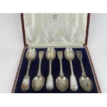 A cased set of six silver spoons, hallmarked London 1935.