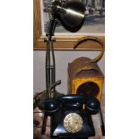 A British Telecom reproduction pyramid type telephone, in a dark green finish,