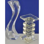 Two crystal glass candlesticks of stylish modern design,