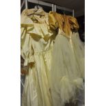 A 1920's style ivory silk wedding dress together with another 1980's cream wedding dress,