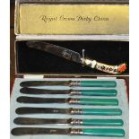 A boxed set of six butter knives, together with another Royal Crown Derby knife, (2).