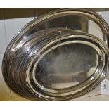 A set of four oval silver plated serving platters,