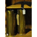 Three First World War brass shell cases together with a vintage Chillington fireman's axe