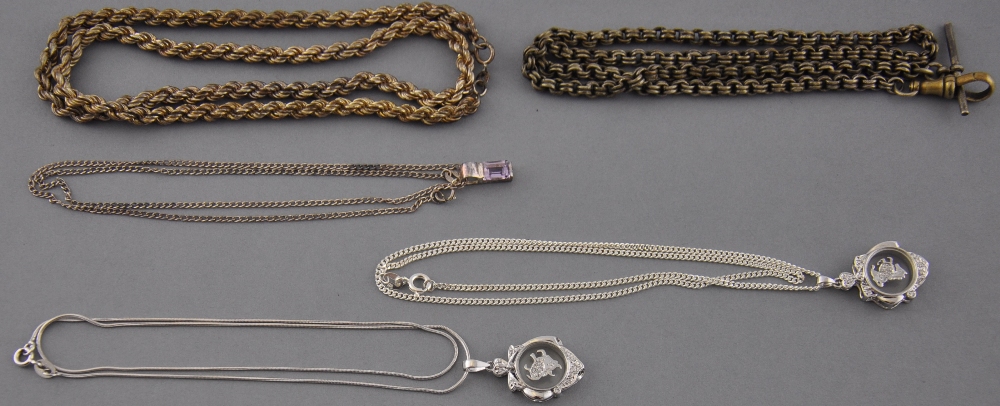 Two silver chains together with 3 pendants with chains