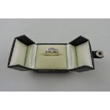 A three stone diamond ring, 2.15 total ct, set in white metal and stamped 18ct, 3.7g.