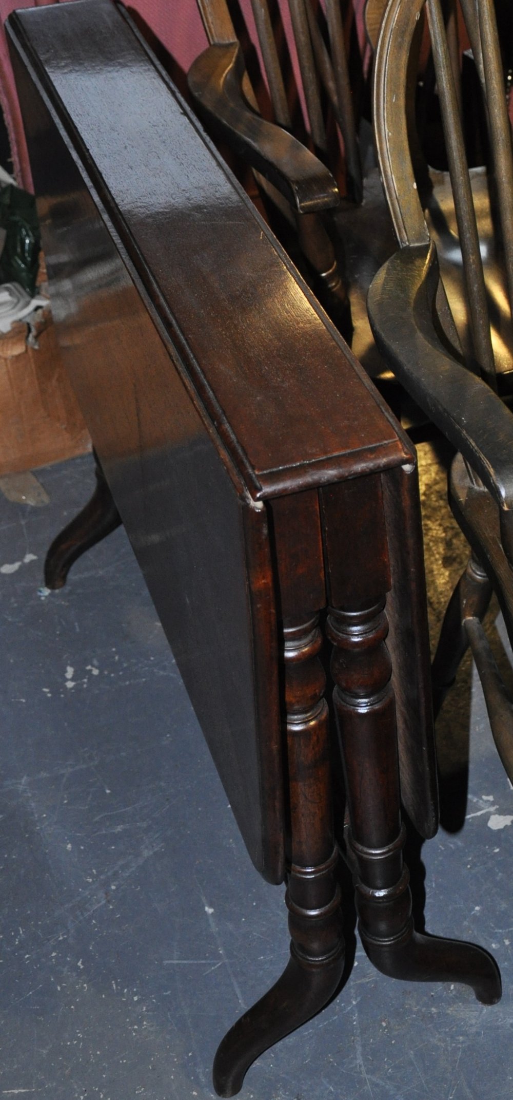 A Victorian mahogany Sutherland table with rectangular twin flap top on shaped feet