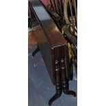 A Victorian mahogany Sutherland table with rectangular twin flap top on shaped feet