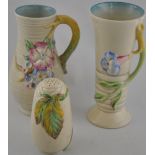 Clarice Cliff pottery, a naturalistic vase with relief decoration of flowers,