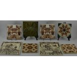A Late Victorian Art Nouveau Faience pottery tile together with a pair of Art Nouveau tiles and