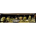 A small collection of copper and brassware including three bells,