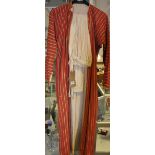 A late 19th/ early 20th Century Middle Eastern gentleman's long jacket and trousers